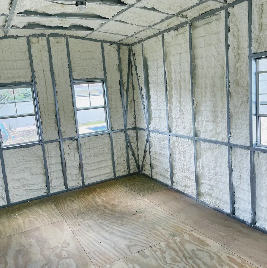 Closed-cell spray foam insulation applied to wall cavities in a residential project in White City